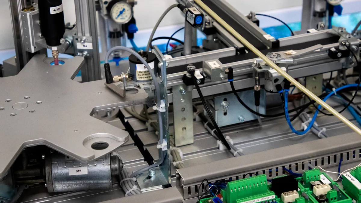 Close-up of industrial automation machinery and controls