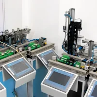 Automated production line with machines and control screens